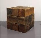 sculptor Carl Andre: 'Trabum / Blocks of wood stacked', American minimal sculpture art, 1977 Carl Andre: Trabum / blocks of wood blocks, minimal sculpture